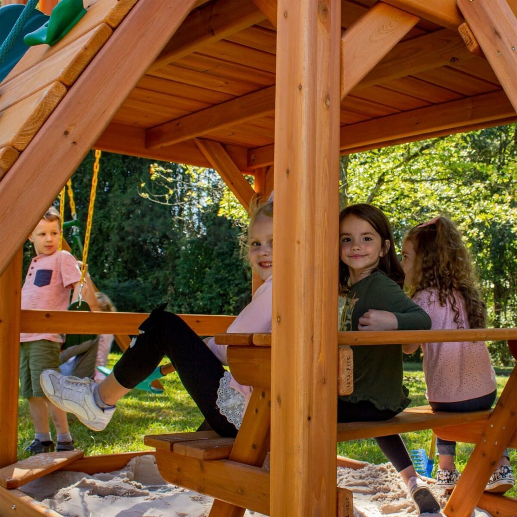 Gorilla Playsets Empire Extreme Wooden Swing Set with Monkey Bars, Clatter Bridge, Tower, and 3 Slides
