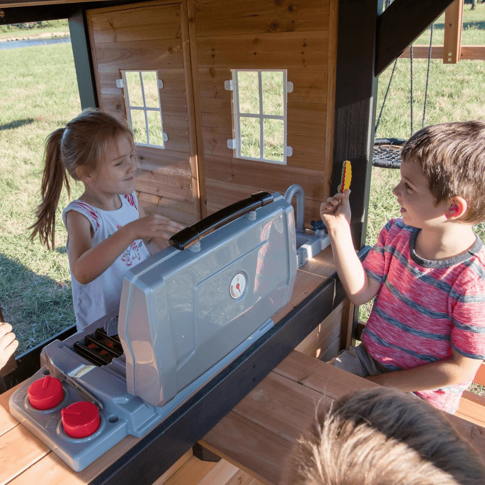 Canyon Creek All Cedar Swing Set Playset w/ Rockwall Upper Fort Belt Swings Web Swing Gray Wave Slide, and Play Kitchen